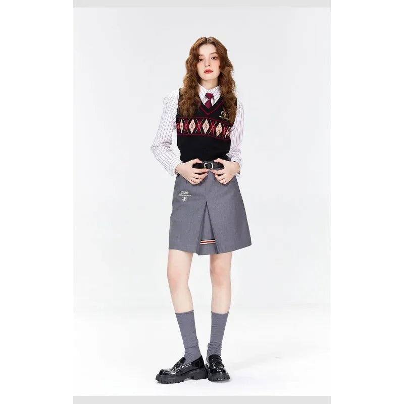 Gilet sans manches tricoté col V à motif losanges style preppy pour femme