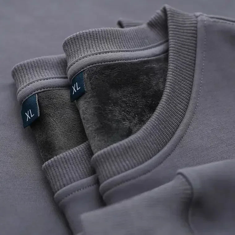 Sweat-shirt col rond doublure douce aspect peluche couleur unie