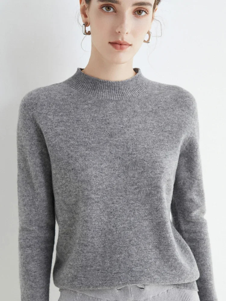 Jersey de punto suave para mujer con cuello alto de canalé y mangas largas