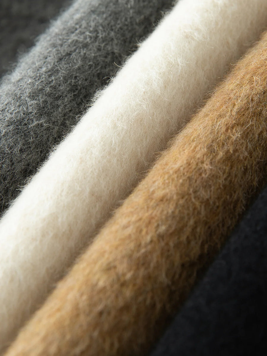 Cappotto lungo da donna dal taglio dritto con cintura in vita e revers ampi