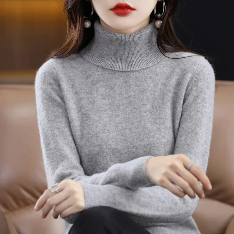 Jersey de mujer de cuello vuelto y mangas largas en color liso