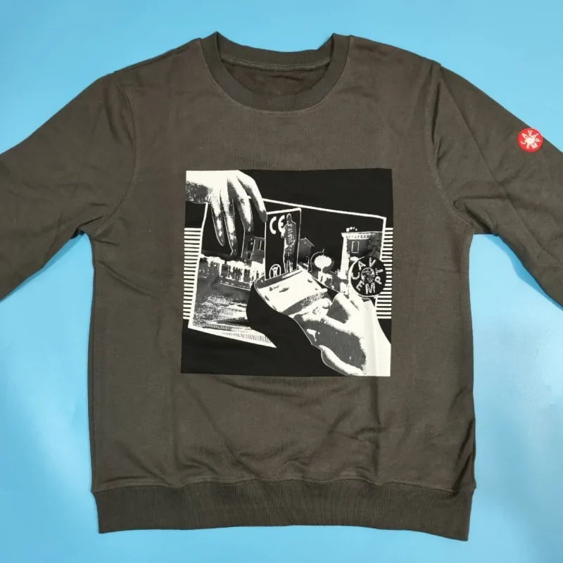 Unisex crew-neck sweatshirt with a graphic design, available in several colors and sizes