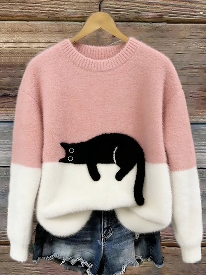 Cozy two-tone sweater with black cat motif, long sleeves and crew neck