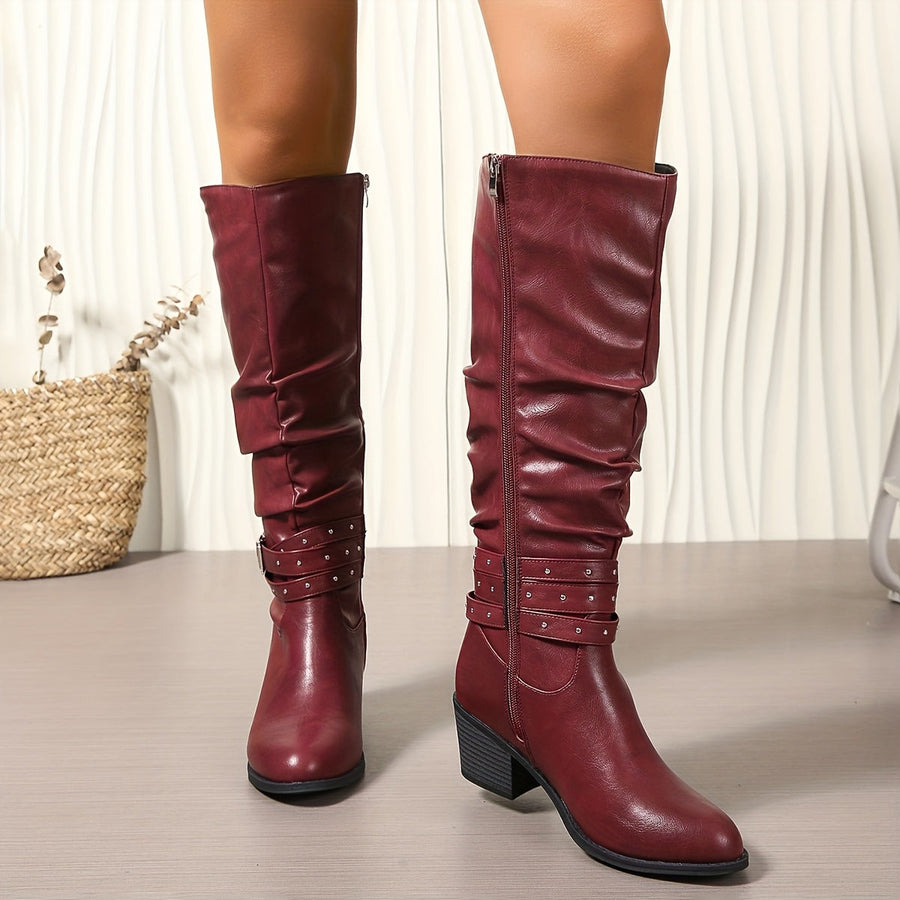 Hoge zwarte dameslaarzen met plooien, gespen en studs