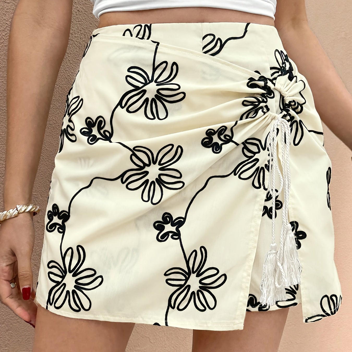 Elegant women's wrap skirt summer style with floral pattern and gathered detail