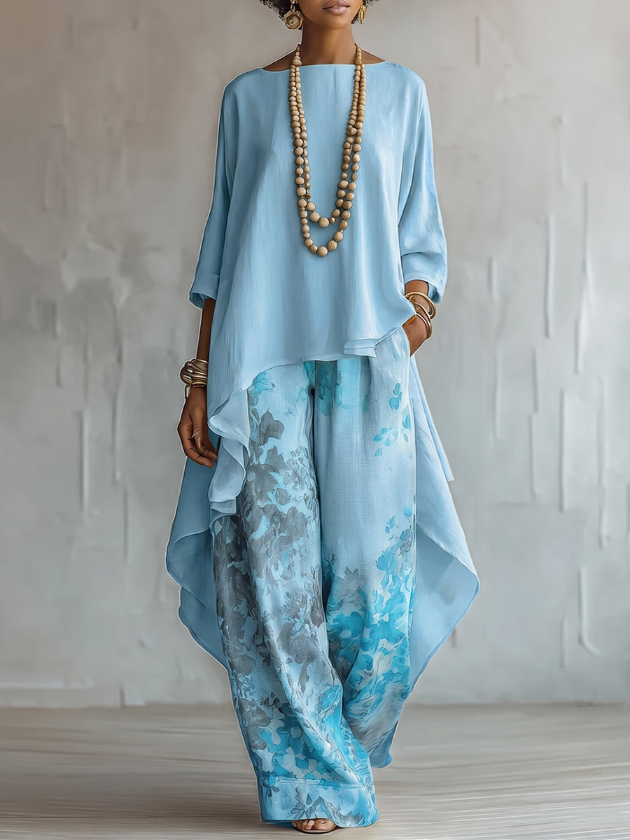 Sett med asymmetrisk bluse og ledig bukse med sennepsfarget trykk