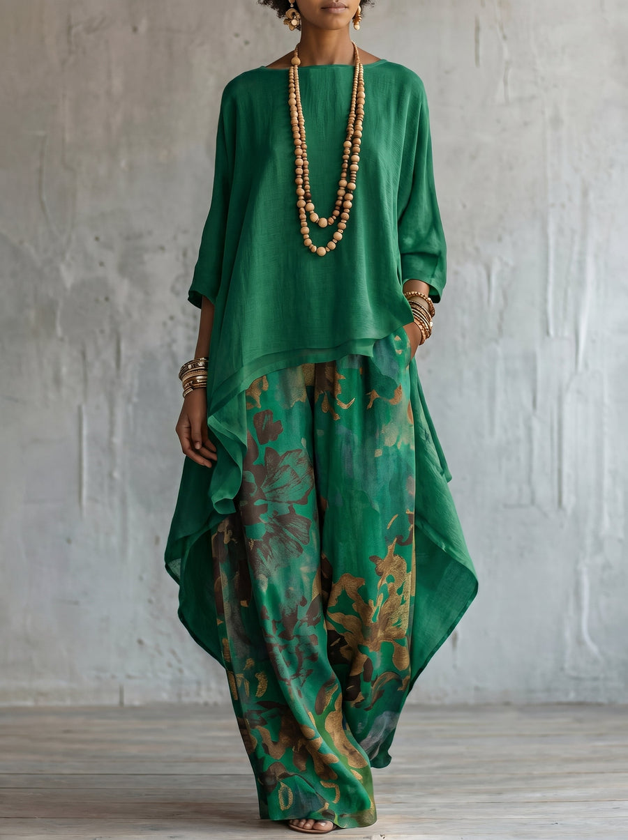 Sett med asymmetrisk bluse og ledig bukse med sennepsfarget trykk