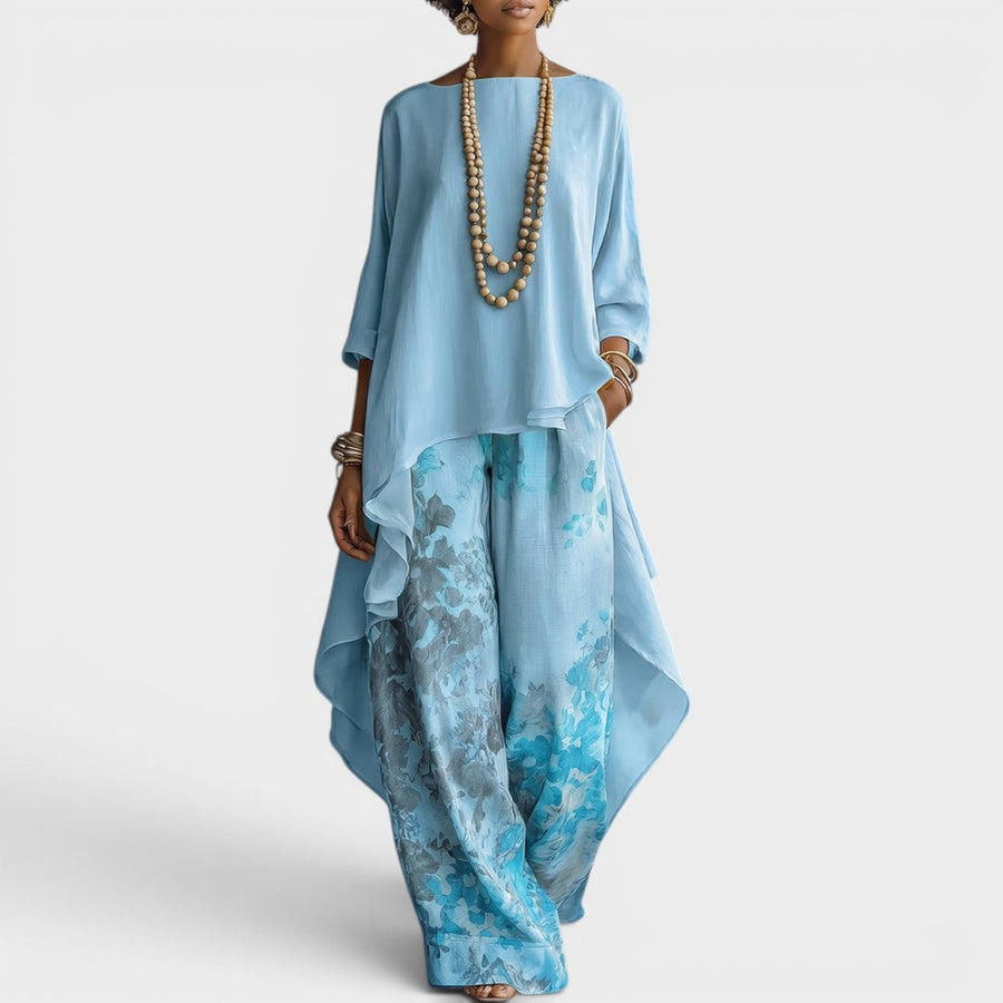 Sett med asymmetrisk bluse og ledig bukse med sennepsfarget trykk