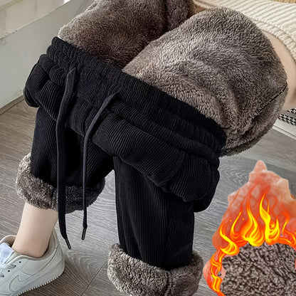 Pantalon en velours côtelé noir doublé polaire coupe ample