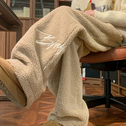 Pantalon large doux en tissu pelucheux avec broderie
