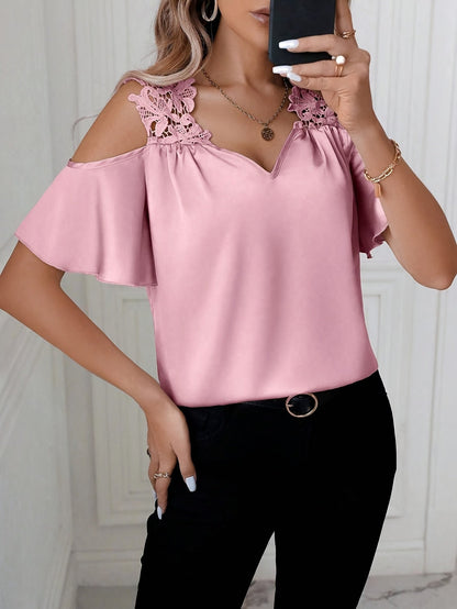 Chique damesblouse met blote schouders en elegante kantdetails