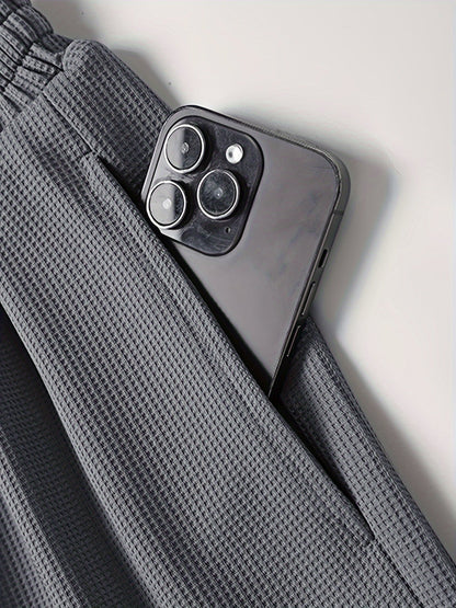 Completo uomo informale due pezzi maglietta larga e pantaloncini stile urbano ideale per relax e uscite
