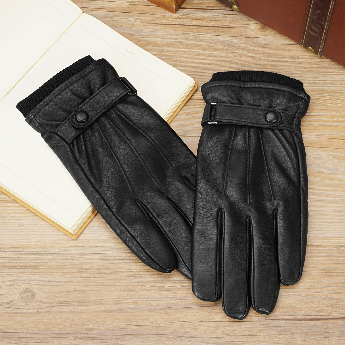 Gants noirs à manchette côtelée et sangle ajustable