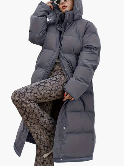Lang elegant dunfrakke til kvinder i urban vinterstil