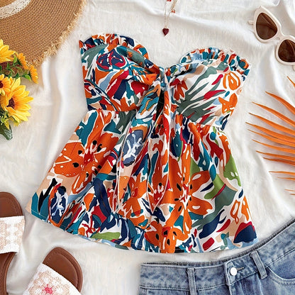 Top senza spalline annodato da donna stile vacanze con motivo floreale astratto – ideale per estate e spiaggia