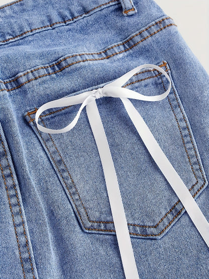 Short denim skirt with decorative bows for women, elegant and casual style