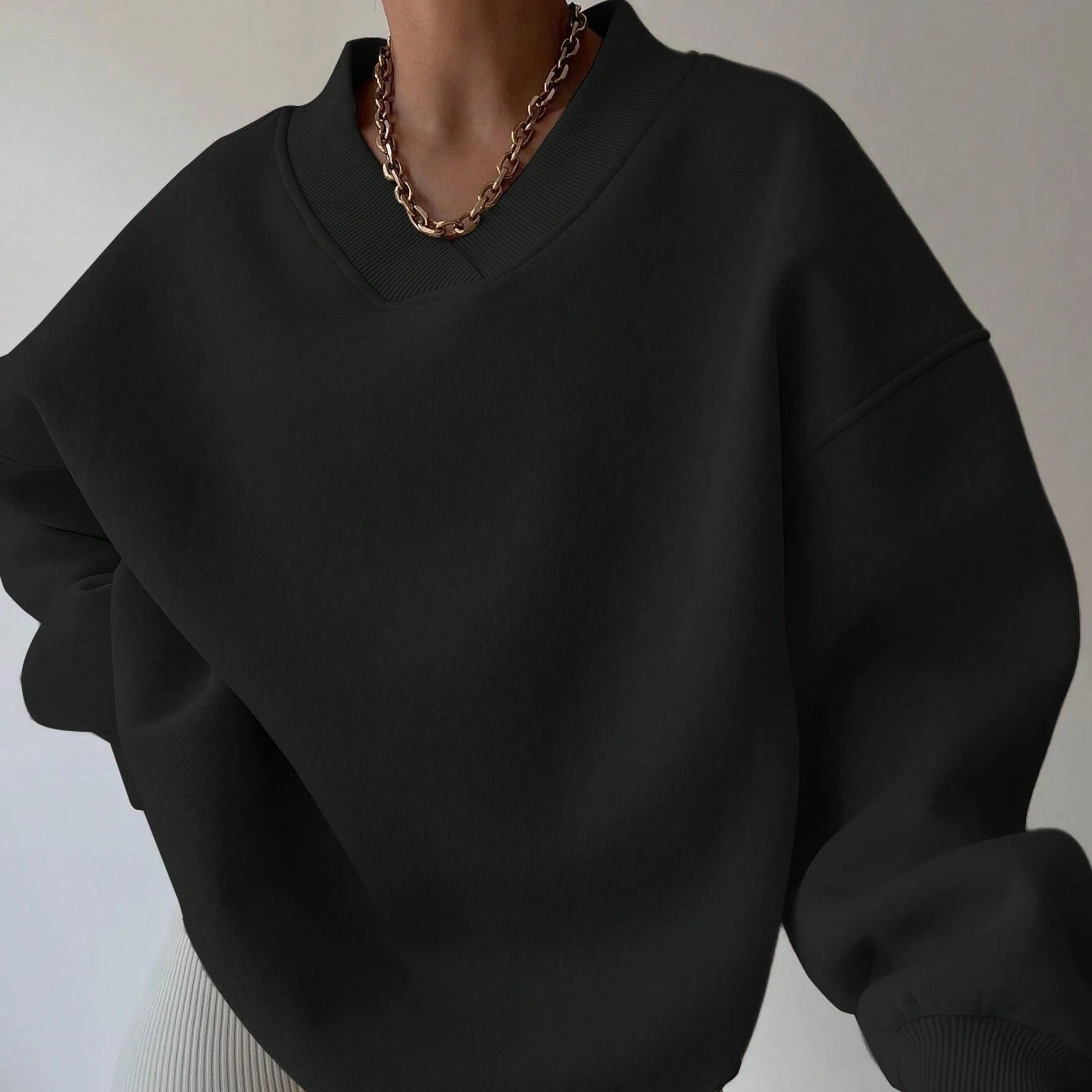 Pull col V femme noir décontracté manches longues