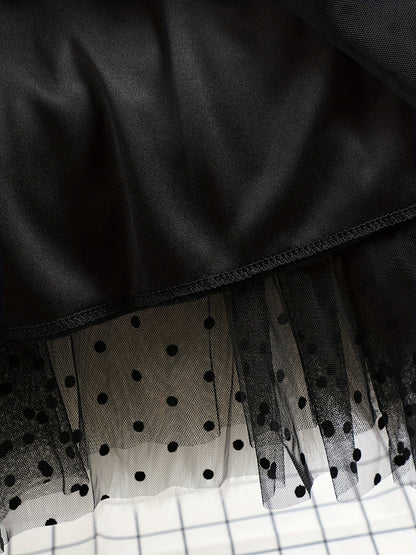 Gonna midi elegante a pois da donna, stile svasato chic, ideale per primavera ed estate