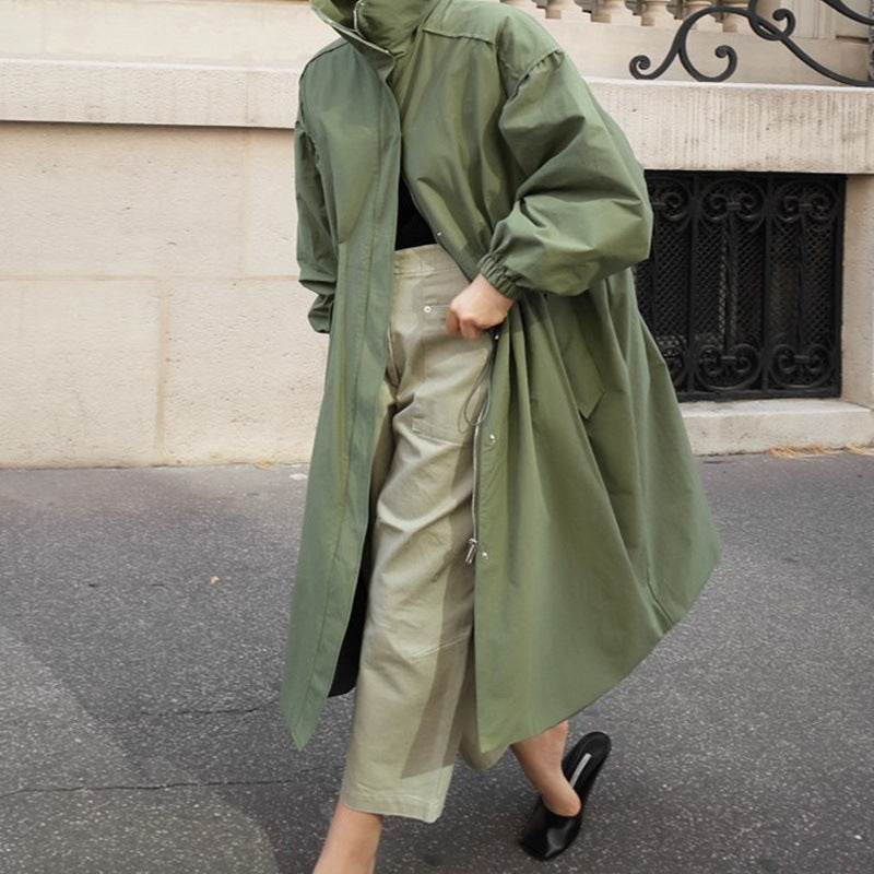Women's loose-fit long navy blue coat with a waist drawstring