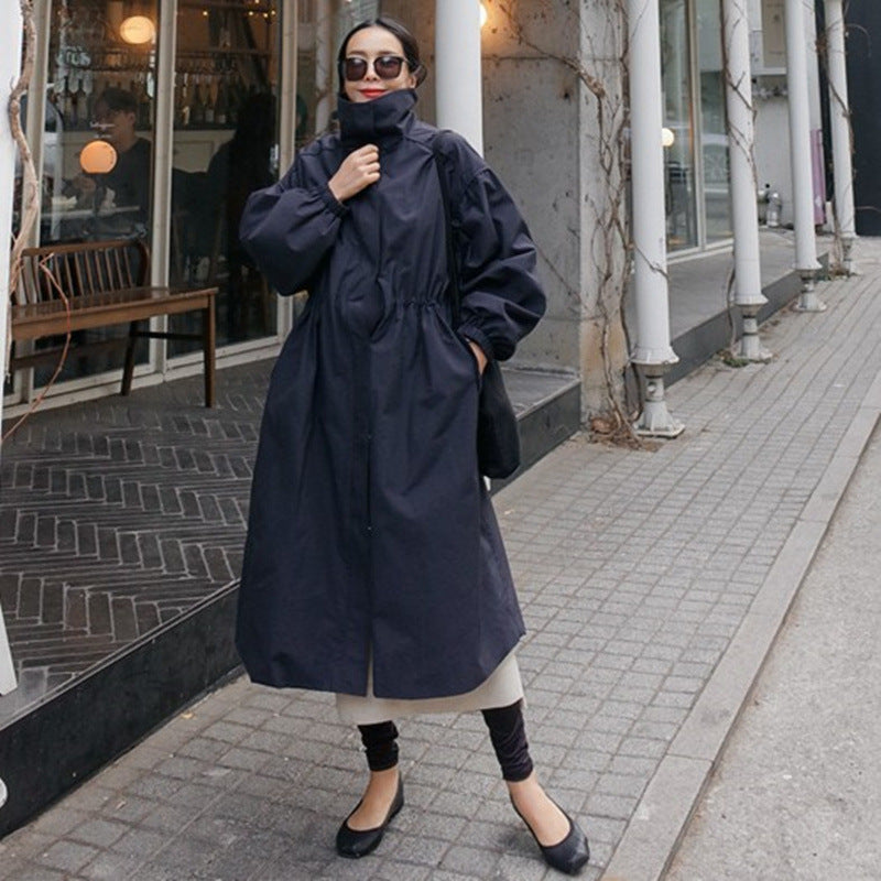Women's loose-fit long navy blue coat with a waist drawstring