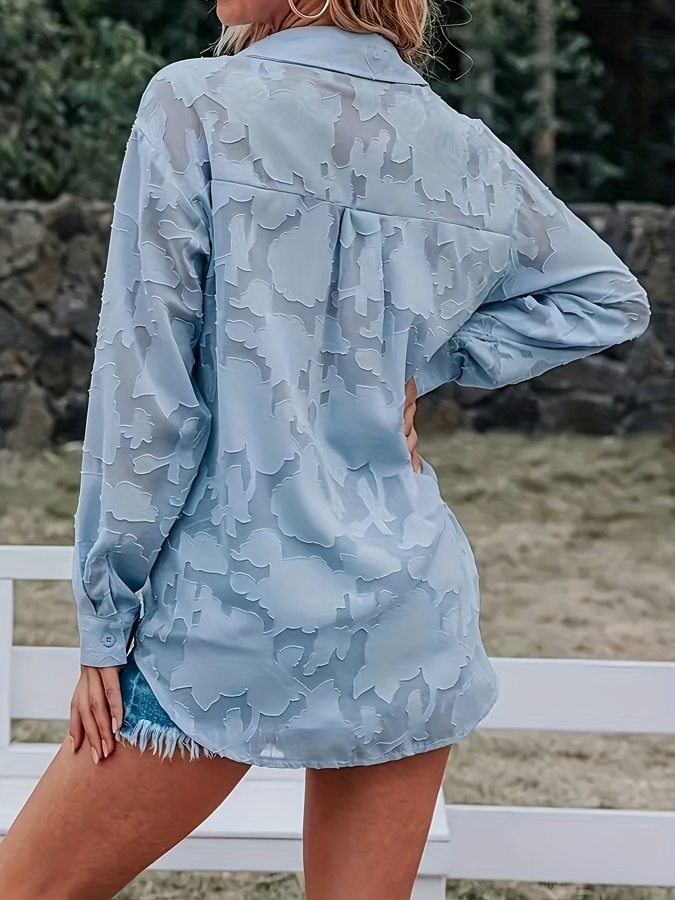 Elegant women's blouse with floral pattern, casual chic style for outings and office