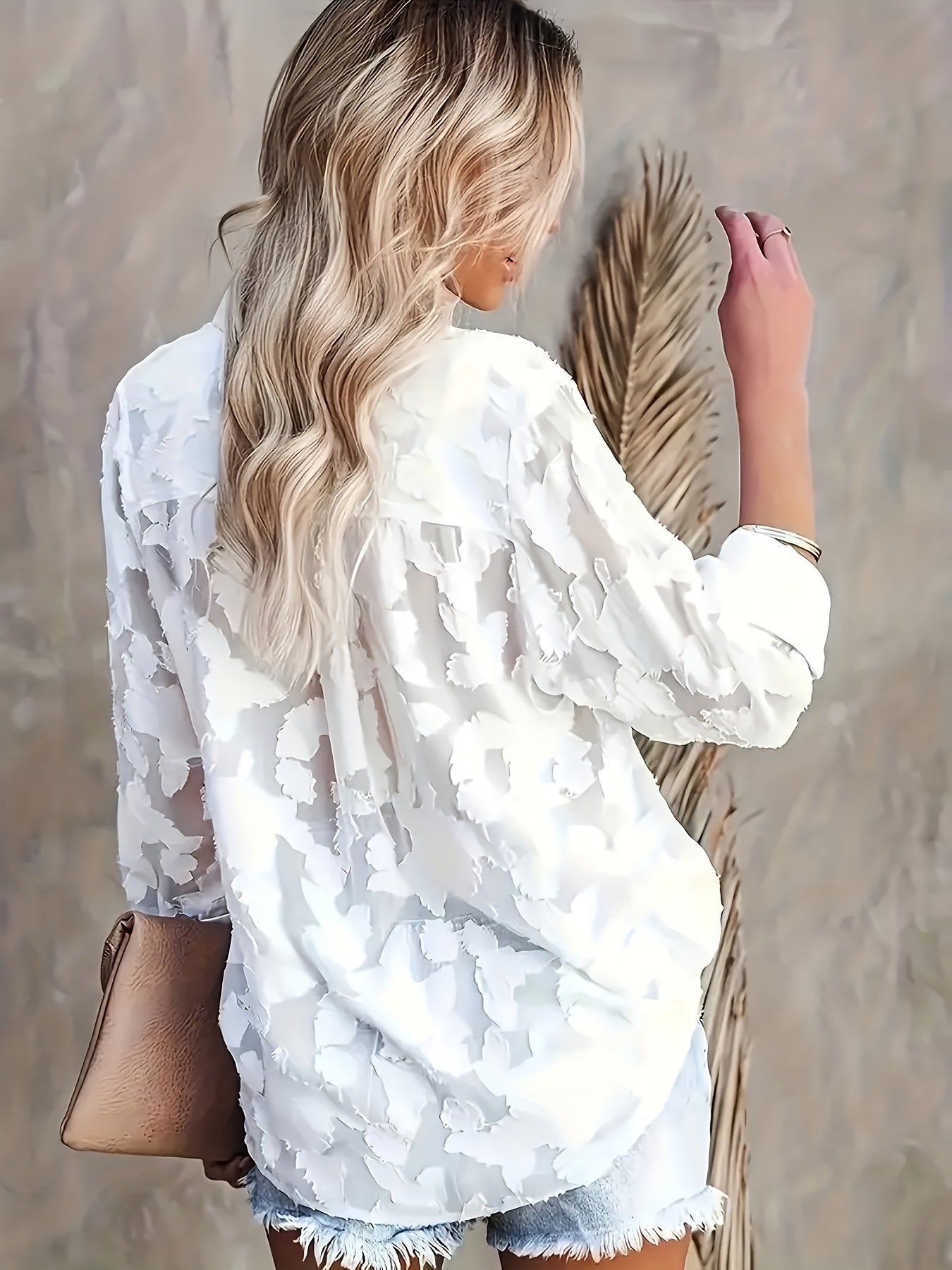 Elegant women's blouse with floral pattern, casual chic style for outings and office