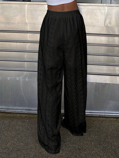 Pantalon large femme style bohème chic pour été, dentelle ajourée, taille élastique, idéal plage et vacances