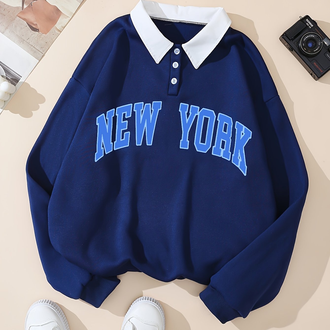 Sweat-shirt col polo bleu marine avec motif "NEW YORK" devant
