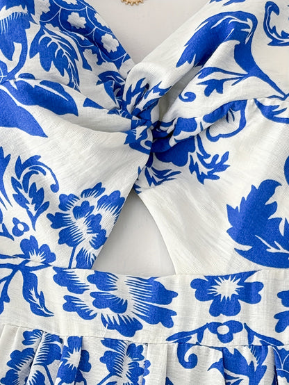 Robe midi femme style bohème chic à fleurs, idéale pour les sorties estivales