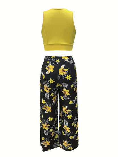 Damesensemble met lange rok met split en tropische print en elegante cropped top voor de zomer