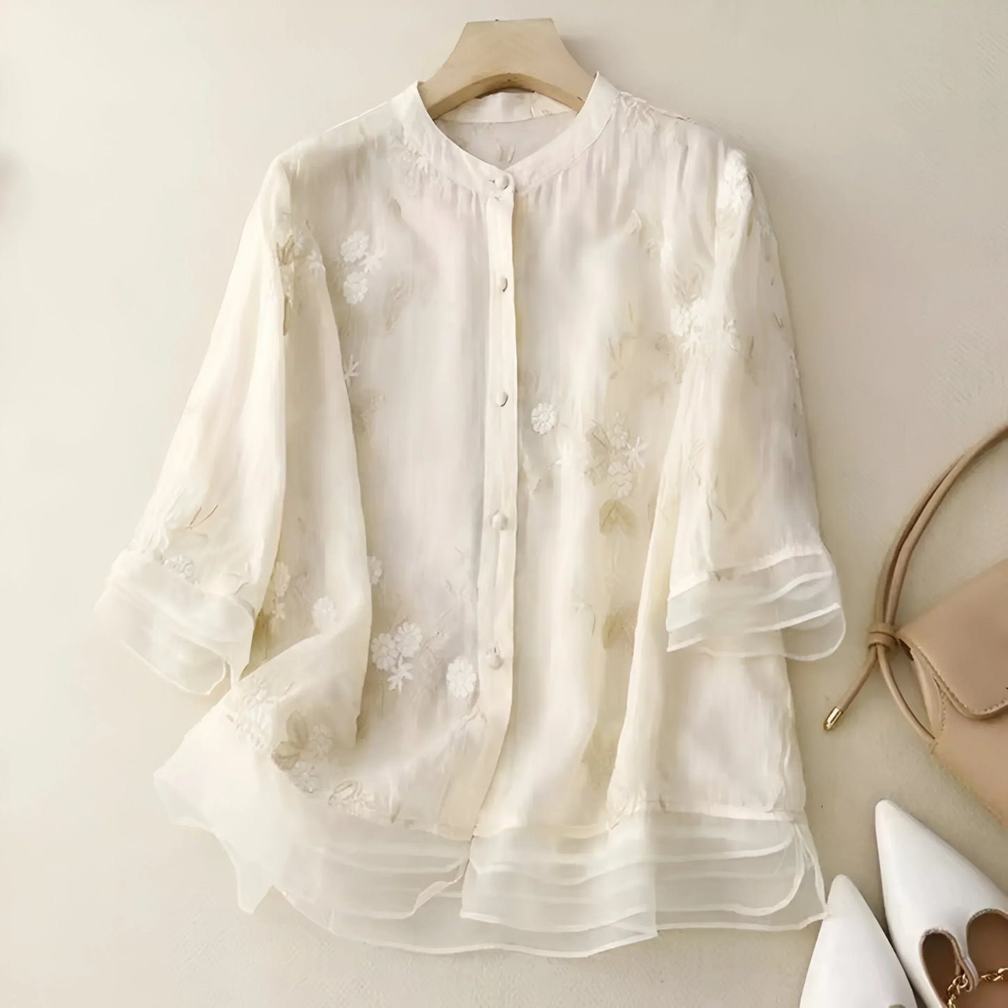 Blusa amplia con bordados florales para mujer, estilo elegante y versátil