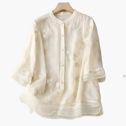 Blusa amplia con bordados florales para mujer, estilo elegante y versátil
