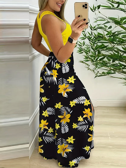 Damesensemble met lange rok met split en tropische print en elegante cropped top voor de zomer