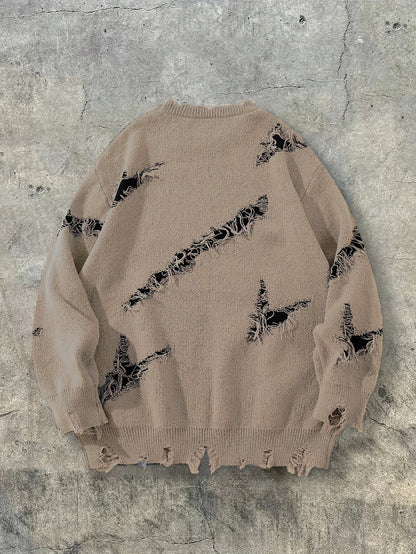 Pull homme gris déchiré oversize avec motif graphique