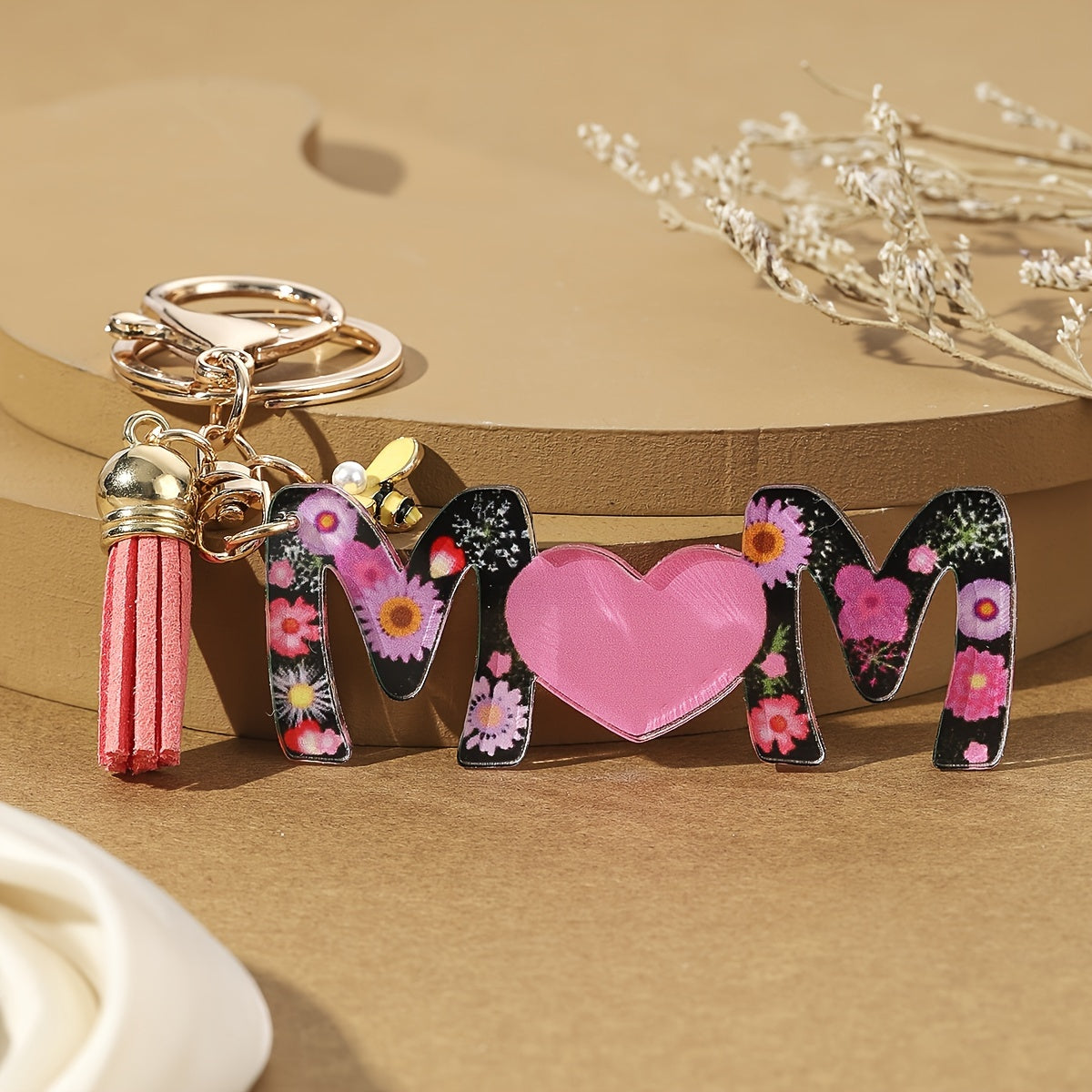 Portachiavi donna stile trendy per la festa della mamma con motivo floreale e cuore