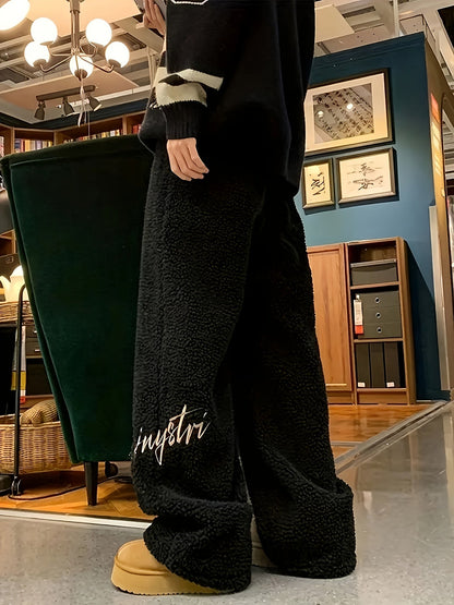 Pantalon large doux en tissu pelucheux avec broderie