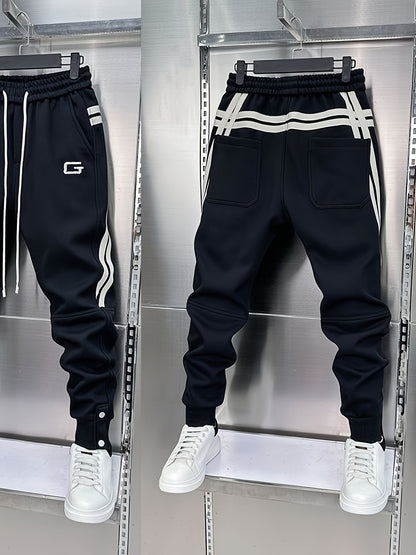 Pantalon de jogging homme avec cordon de serrage, rayures latérales et boutons pression, coupe fuselée
