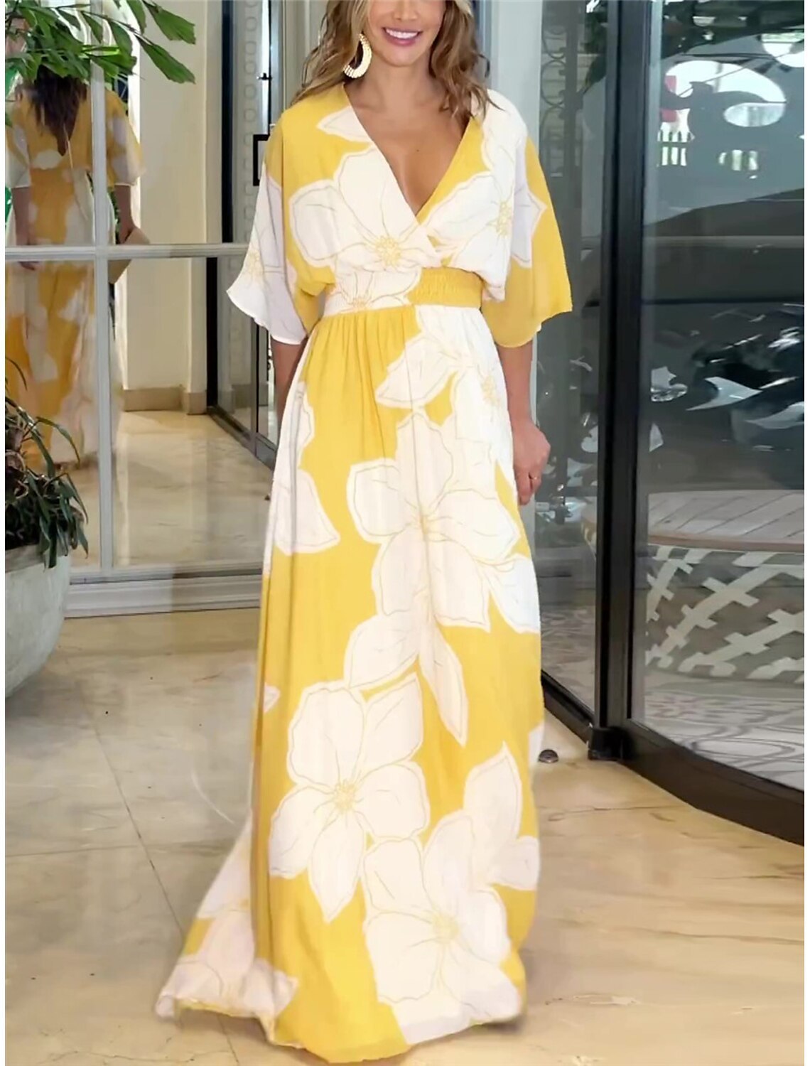 Robe longue femme élégante à fleurs style bohème pour occasions estivales