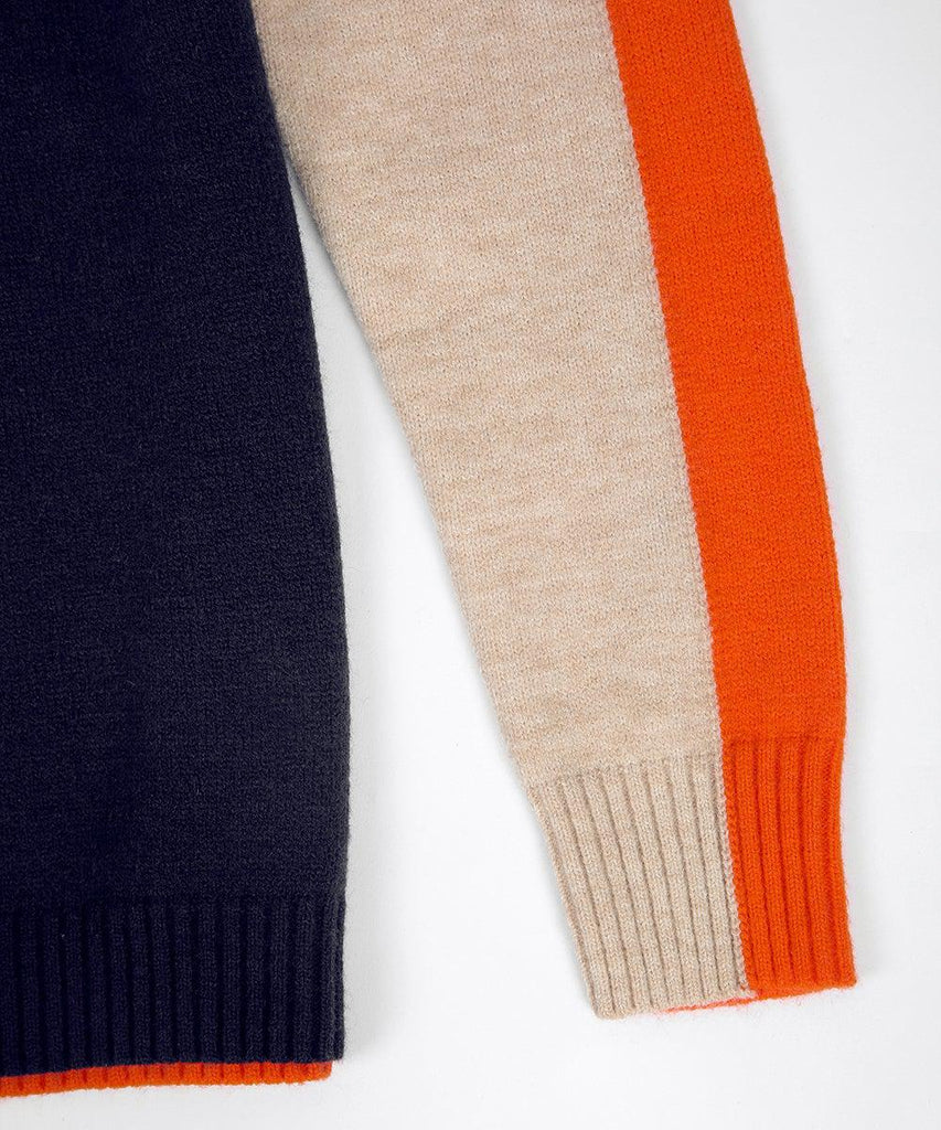 Damski sweter w nowoczesnym stylu z graficznymi paskami – codzienny miejski look