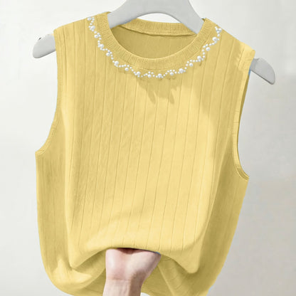 Elegante dames mouwloze top met parelmoerlook en ronde hals, geschikt voor uitgaan of kantoor