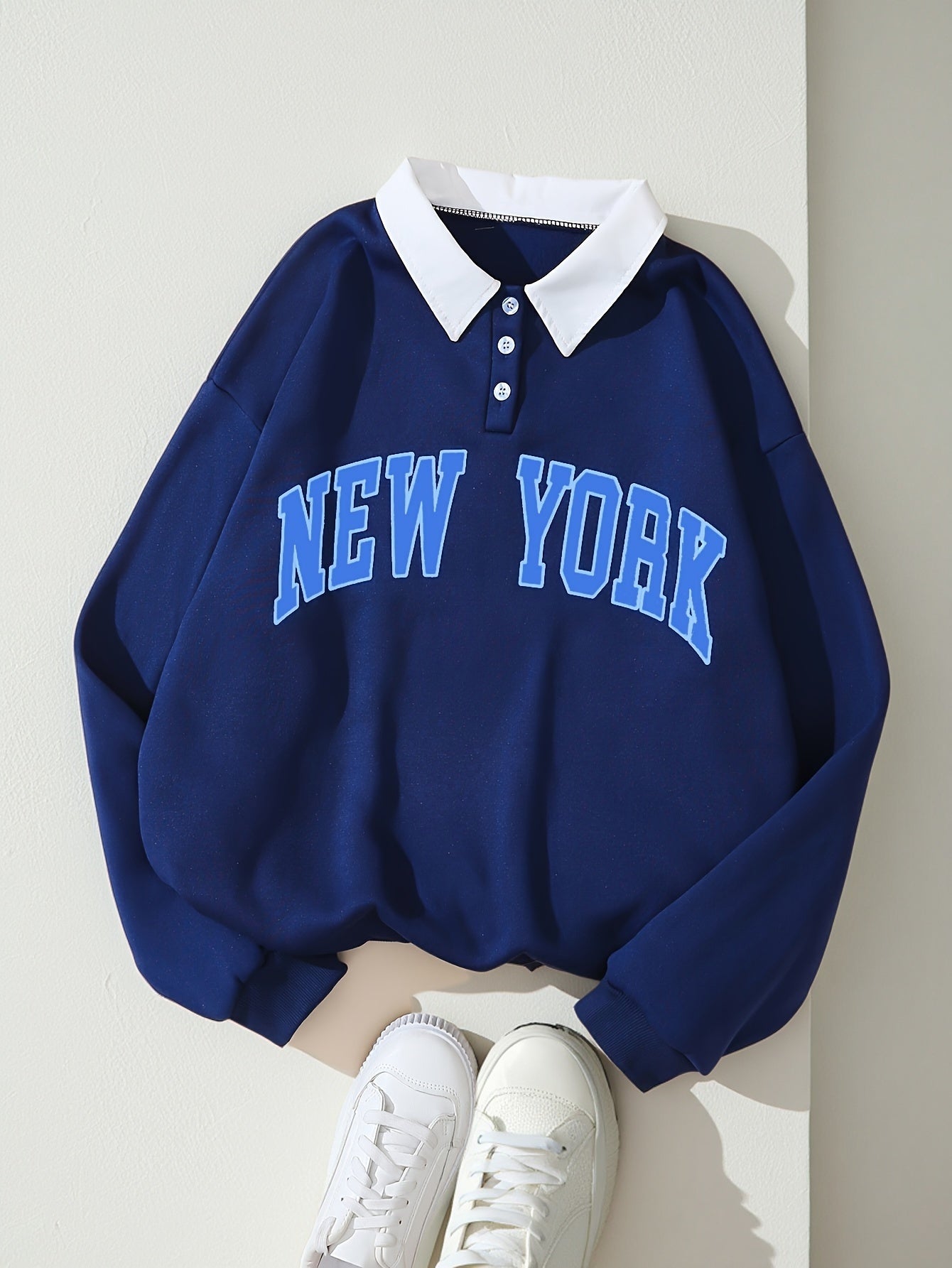 Sweat-shirt col polo bleu marine avec motif "NEW YORK" devant