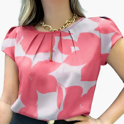 Elegant blus för kvinnor med abstrakt mönster, korta ärmar, chic stil för kontoret och utflykter