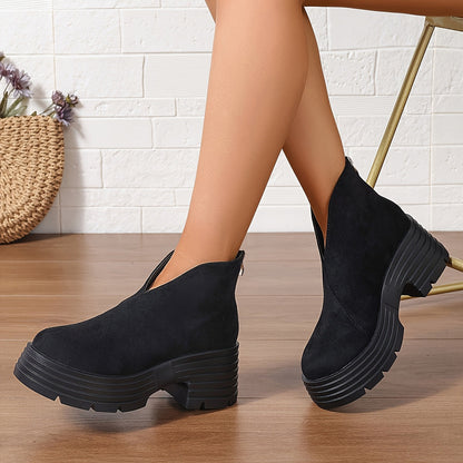 Bottes courtes compensées femme noires à semelle épaisse et fermeture éclair