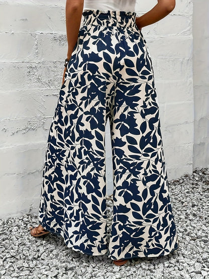 Pantalon large femme style bohème chic taille haute à imprimé feuillage pour occasions estivales et sorties élégantes
