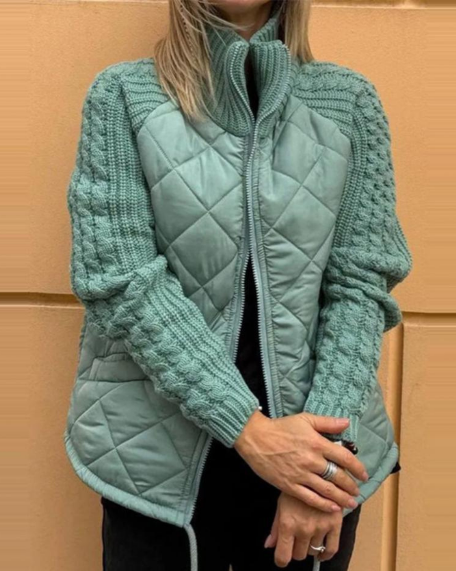 Women's quilted jacket with knitted sleeves and stand-up collar
