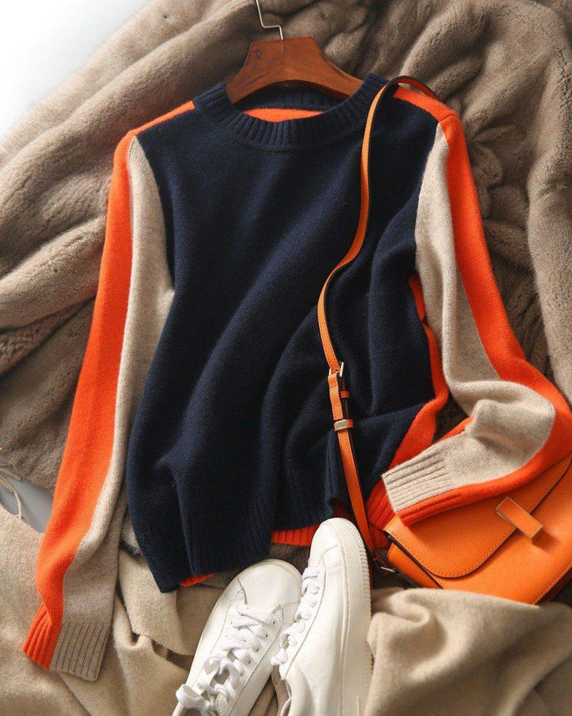 Damski sweter w nowoczesnym stylu z graficznymi paskami – codzienny miejski look