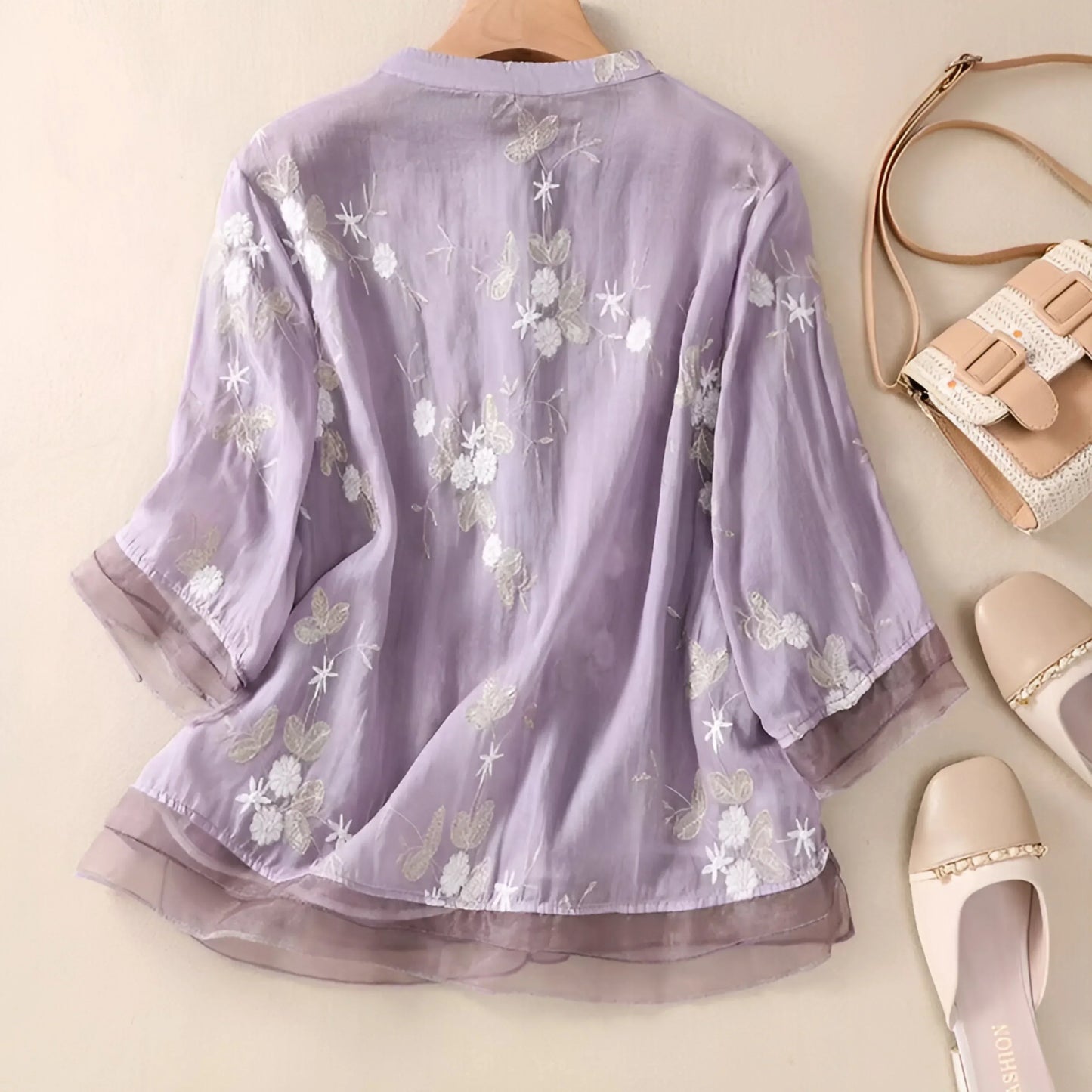 Blusa amplia con bordados florales para mujer, estilo elegante y versátil