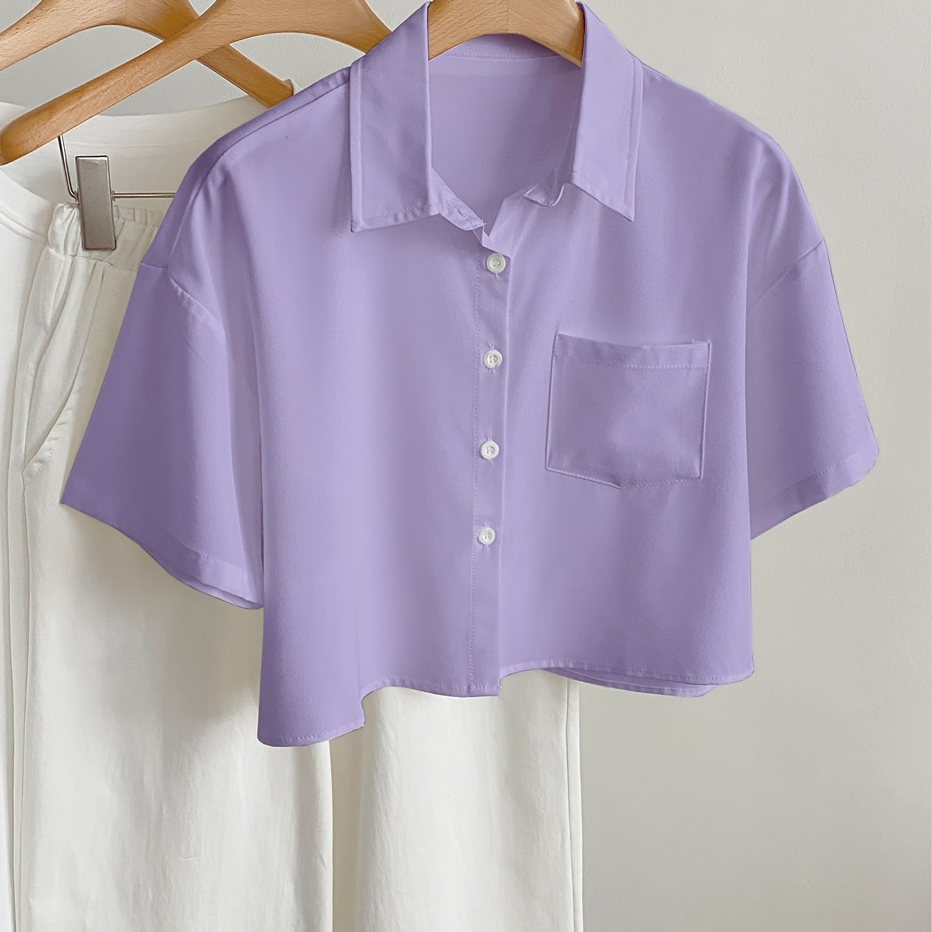 Camicia casual donna maniche corte stile moderno con orlo corto