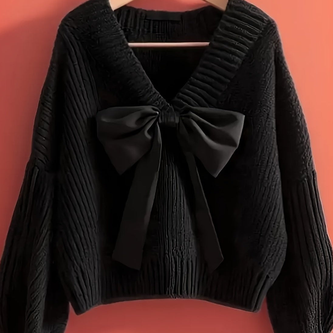 Pull en maille côtelée col V avec grand nœud décoratif pour femme
