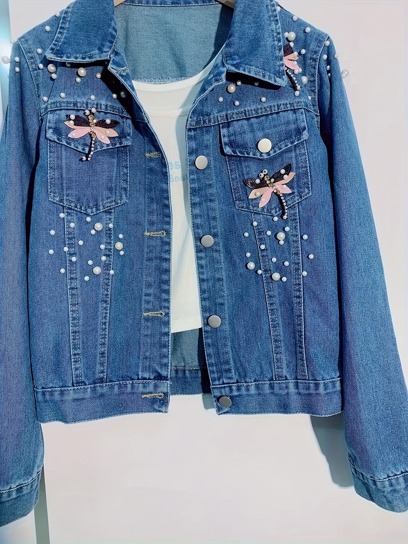 Veste en jean femme bleue brodée de perles et ornements